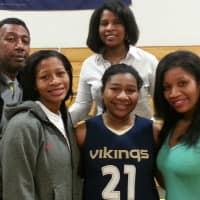 <p>Norwalk&#x27;s Brown family of (back row) Tyrone and Carol and (front, left to right) Briana, Tatiana and Elisa have set an impressive high school basketball scoring standard.</p>