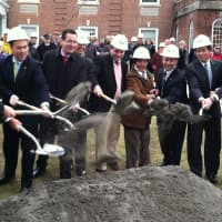 <p>Gov. Dannel Malloy, center, without hardhat, tosses dirt along with many other local and state officials to commemorate the start of major renovations to Greenwich&#x27;s Nathaniel Witherell Nursing Center.</p>