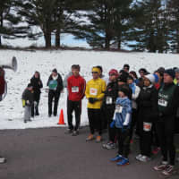 <p>Sean Kelly, who organized the 5K, speaks to the participants before they begin. </p>