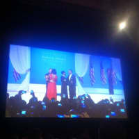 <p>A cell phone photo of President Obama and the First Lady.</p>