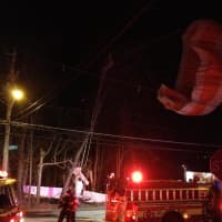 <p>Three people survived a small plane crash on South Street Tuesday night. A parachute helped break the fall.</p>