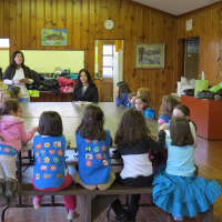 <p>A group of young Eastchester Girl Scouts listens intently during the presentation on bullying.</p>