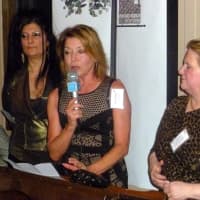 <p>From left, Maggie Nader of the Pound Ridge Business Association, and Terry Pike and Susan Grissom of the Pound Ridge Partnership, address the crowd at the streetlight fund-raiser at the Bedford Post Inn.</p>