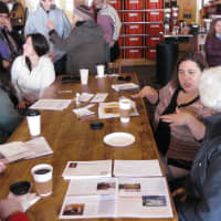 <p>Westchester County Legislator Catherine Borgia chats with residents at The Black Cow in Croton-on-Hudson in 2015.</p>
