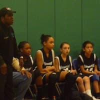 <p>Rick Fulton coaches the Norwalk Girls Basketball Association sixth-grade team, which is 18-0.</p>
