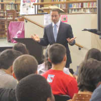 <p>Westchester County Executive Rob Astorino speaks to Ossining High School business students Tuesday about achieving success in business.</p>