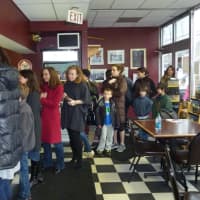 <p>Customers line up at the Great Cakes bake shop in Westport on Wednesday afternoon after news spread that the store was facing closure.</p>