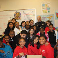 <p>Peekskill Police Officer Leo Dylewski with Peekskill sixth graders. Dylewski leads the district&#x27;s D.A.R.E. and G.R.E.A.T. programs.</p>