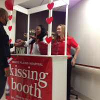 <p>Nurses give Jermaine Barnett, office assistant at White Plains Hospital, dark chocolate kisses as part of the hospital&#x27;s Go Red Campaign.</p>