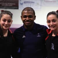 <p>Westport&#x27;s Kristen Onorato, left, and her twin sister, Pamela, meet U.S. Olympic gymnast John Orozco at Arena Gymnastics in Stamford.</p>