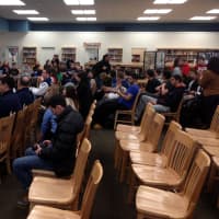 <p>Dozens of students, faculty members and loved ones attended the ceremony to support Westlake High School football player Tommy Hopkins.</p>