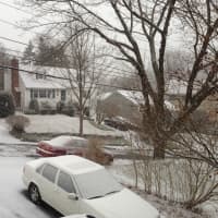 <p>Snow blankets cars Friday morning. </p>
