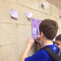 <p>Briarcliff Middle School students write notes as part of PS I Love You Day. </p>