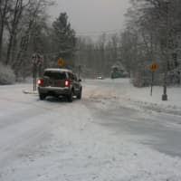 <p>Snow plows swept the streets of Ossining Friday afternoon as the storm moved in. </p>