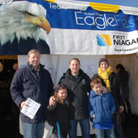 <p>Westchester County Executive Rob Astorino and his two children pose with David Ring, Managing Director of Enterprise Banking for First Niagara, a Yorktown resident (L), and Naomi Marrow, chair of the Teatown Board at Teatown&#x27;s EagleFest Sunday.</p>