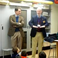 <p>U.S. Rep. Jim Himes and veteran Phil Kraft  share some history lessons with students at K.T. Murphy Elementary School in Stamford. </p>