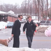 <p>Kevin Bacon, star of the Fox TV show &quot;The Following,&quot; walks his dog while on set outside of the Town of Ossining Police Station in Briarcliff Manor.  </p>
