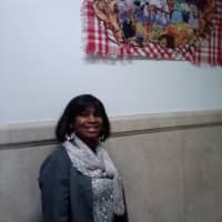 <p>Artist and Mount Vernon resident Fanny Miller-Beard shows her piece &quot;Sunday Heritage&quot; at City Hall.</p>