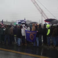 <p>Hundreds of Connecticut workers line the sidewalks in Stamford in protest of local jobs being given to out-of-state workers.</p>
