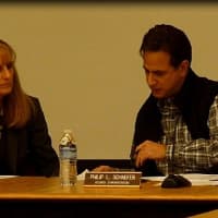 <p>Weston superintendent of schools Colleen Palmer, left, and school board president Philip Schaefer confer before Monday&#x27;s meeting.</p>