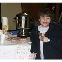 <p>Scarsdale kindergartener Evan Greenberg at his cocoa event several years ago.</p>