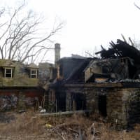 <p>Yonkers firefighters are trying to determine the cause a two-alarm blaze at 35 Odell Ave. </p>