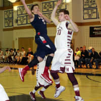 <p>Hunter Eggers of Greenwich glides in for a basket during a game earlier this season.</p>