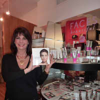 <p>Westport resident and Faces Beautiful owner Gail Sagel shows off a copy of her book &quot;Making Faces Beautiful,&quot; which will soon be released.</p>