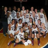 <p>Ossining holds up three fingers after winning its third consecutive Section 1 Class AA Girls basketball title. The Pride beat Our Lady of Lourdes, 83-51 Sunday.</p>