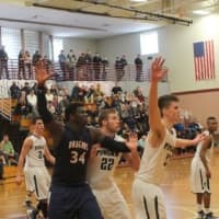 <p>Greens Farms&#x27; Sean Obi finds himself double-teamed by Pingree defenders. </p>