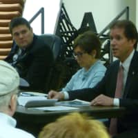 <p>State Sen. L. Scott Frantz, right, addresses a crowd at a town hall meeting in Stamford on proposed gun control legislation. Rep. Livvy Floren (R-Greenwich), center, and Rep. Mike Molgano (R-Stamford), left, also spoke.</p>