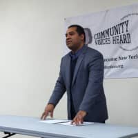 <p>Carlos Hodgson of Community Voices Heard speaks Tuesday during the State of the People address inside the group&#x27;s North Broadway office. </p>
