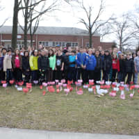 <p>Eastchester students pose with the hearts they decorated.</p>