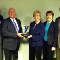 <p>Westport Weston Family Y officials present Linda McMahon, third right, with a thank-you gift for her foundation&#x27;s $1 million donation to the new Y facility. </p>