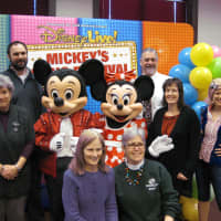 <p>Even the Boys &amp; Girls Club of Northern Westchester staff take a picture with Mickey and Minnie Mouse.</p>