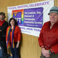 <p>Scott Havelka (left) and Al Raymond (right) of the LOFT, a White Plains LGBT community center, talk to Deaconess Darlene DiDomineck of Memorial United Methodist Church about the same-sex marriage cases before the U.S. Supreme Court.</p>
