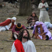 <p>The Rev. Vincent Druding as Jesus and members of the Assumption parish re-enact the Stations of the Cross on Friday in Peekskill.</p>