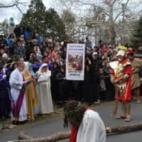 <p>The Rev. Vincent Druding as Jesus and members of the Assumption parish re-enact the Stations of the Cross on Friday in Peekskill.</p>