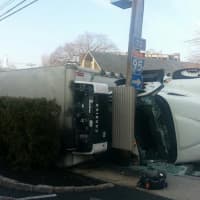 <p>An overturned tractor-trailer is causing traffic chaos on Field Point Road right near Greenwich Town Hall on Monday morning.</p>
