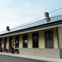 <p>Solar panels installed on the roof of the eastbound station house at Westport&#x27;s Metro-North station power the building, platform lights and four adjacent car-charging stations.</p>