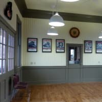 <p>The renovated eastbound station house at the Westport Metro-North stop in Saugatuck boasts vintage decorations, including railroad posters.</p>