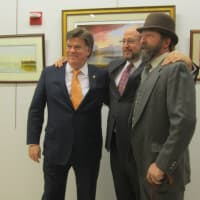 <p>Ossining Bicentennial Committee Chairman George Camp, Mayor William Hanauer and Ossining Historical Society President John Wunderlich celebrate the village&#x27;s Bicentennial Celebration Tuesday night. </p>