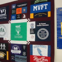 <p>The quilt made for the people of Newtown, featuring the logos of more than 30 Westchester and Putnam teacher unions.</p>