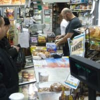 <p>A busy morning rush in the Hastings-on-Hudson Madaba deli.</p>