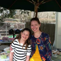 <p>Eloise Barjak with mom Sue at their bake sale.</p>
