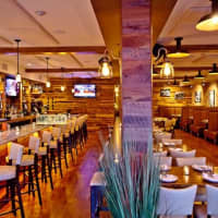 <p>A New York Times reviewer recommended the burgers and pizzas at Darien Social. </p>