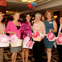 <p>Sandy Samberg, third from left, and other members of Sole Ryders help out at a Breast Cancer Alliance event earlier this year.</p>