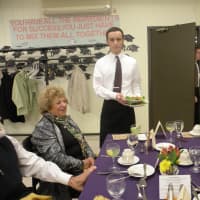 <p>Michael Feist, of Briarcliff, serves the customers, including his mother, right, and BOCES board member Anita Feldman at &quot;Educated Palate&quot; in Yorktown Heights.</p>