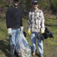 <p>Residents pick up trash for the fifth annual Village Cleanup Day.</p>