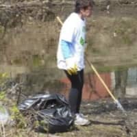 <p>Residents pick up trash for the fifth annual Village Cleanup Day.</p>